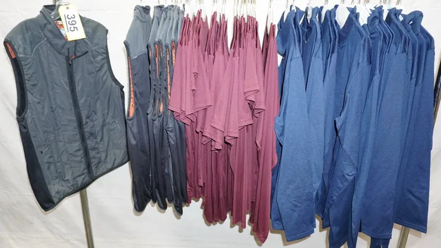 Auction lot 395: a rack of vests and shirts on hangers, from @chiropractic's post